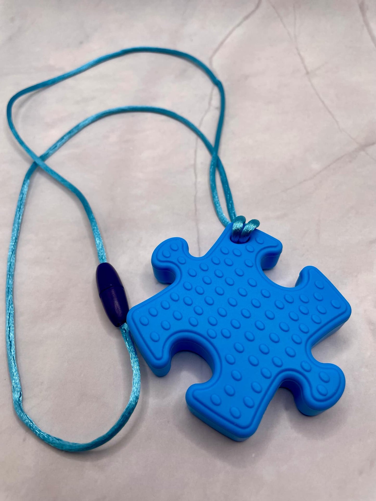 Jouet de dentition puzzle; PENDENTIF - CASSE-TETE PUZZLE FDMT ORAL MOTEUR