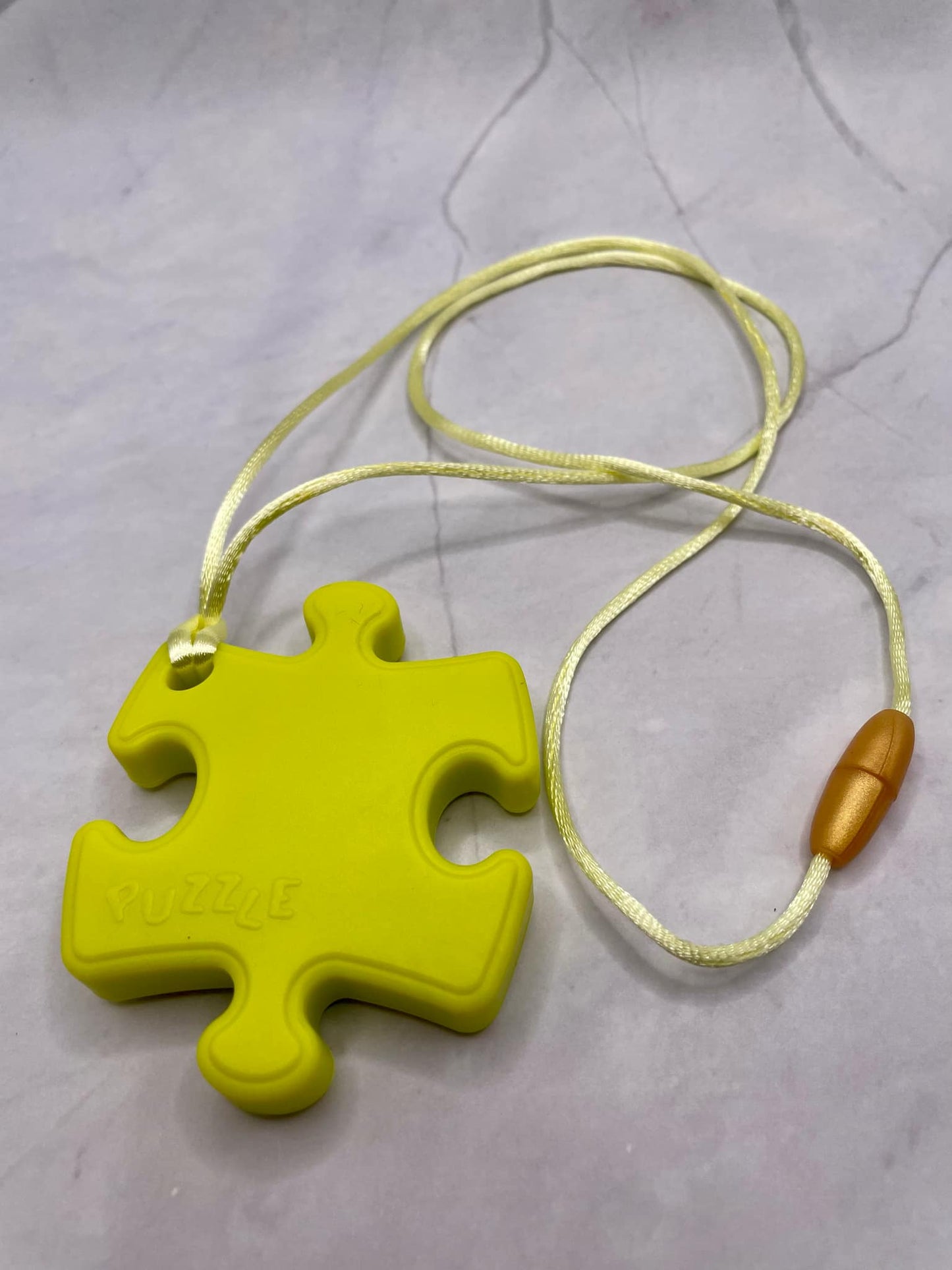 Jouet de dentition puzzle; PENDENTIF - CASSE-TETE PUZZLE FDMT ORAL MOTEUR