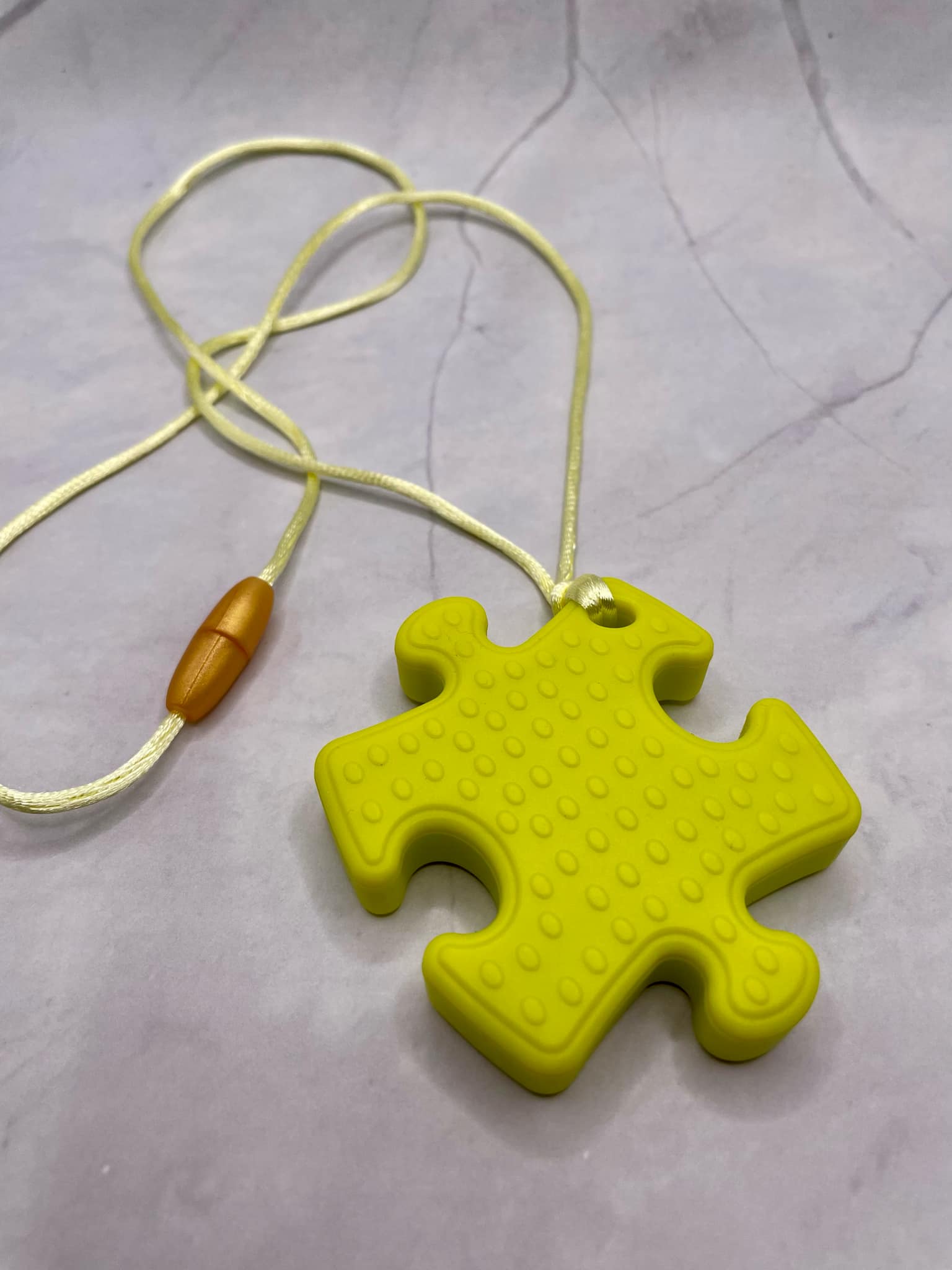 Jouet de dentition puzzle; PENDENTIF - CASSE-TETE PUZZLE FDMT ORAL MOTEUR