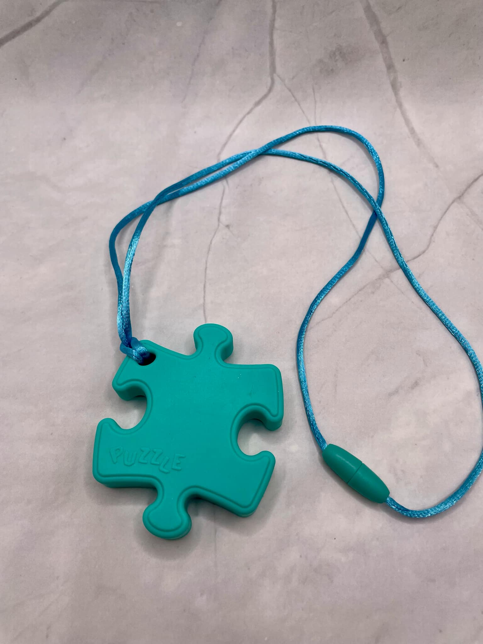 Jouet de dentition puzzle; PENDENTIF - CASSE-TETE PUZZLE FDMT ORAL MOTEUR